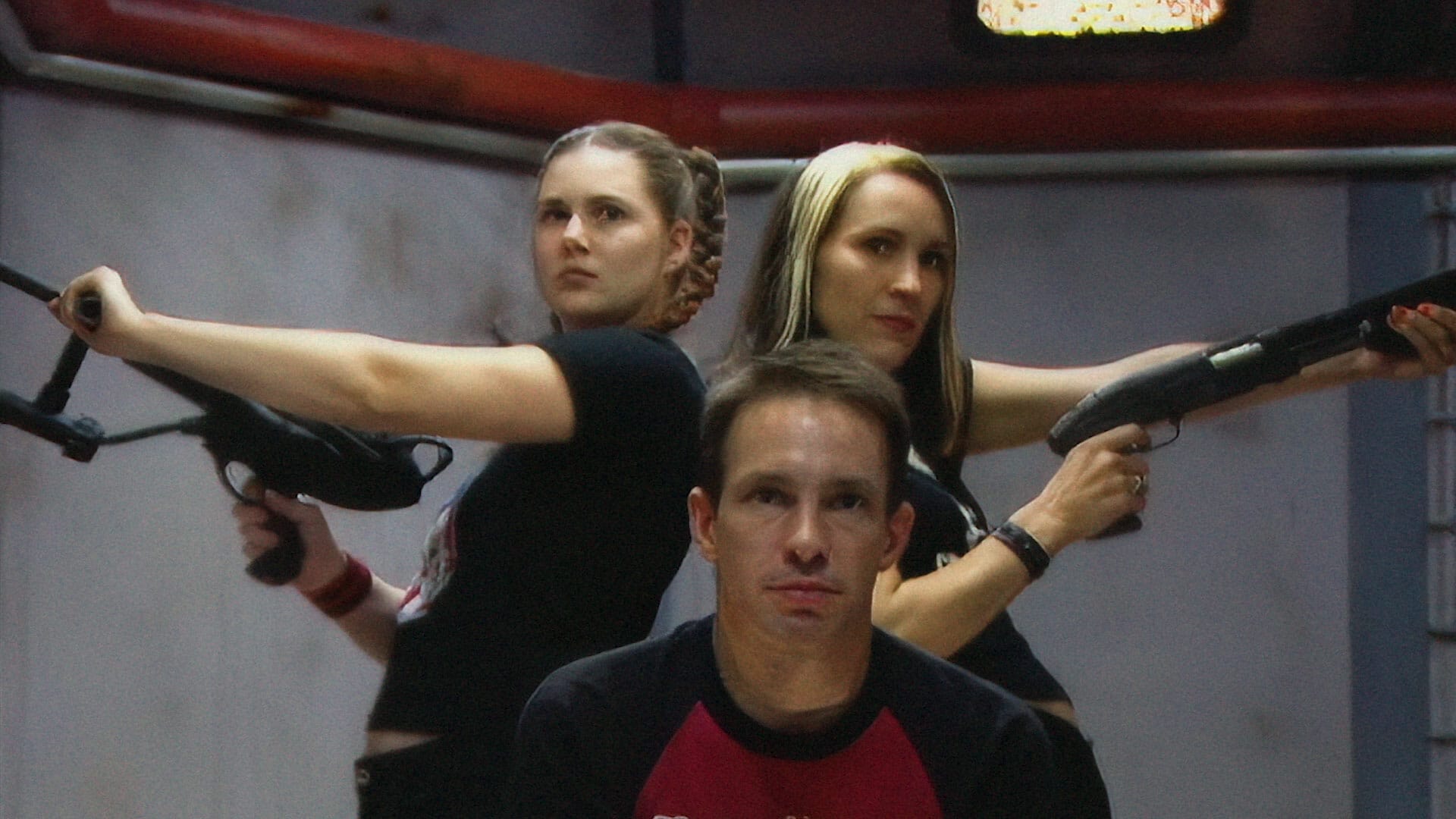 'Til Death Do Us Party music video featuring three women holding guns in a room.